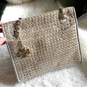 Tory Burch multi-way metallic shoulder bag.